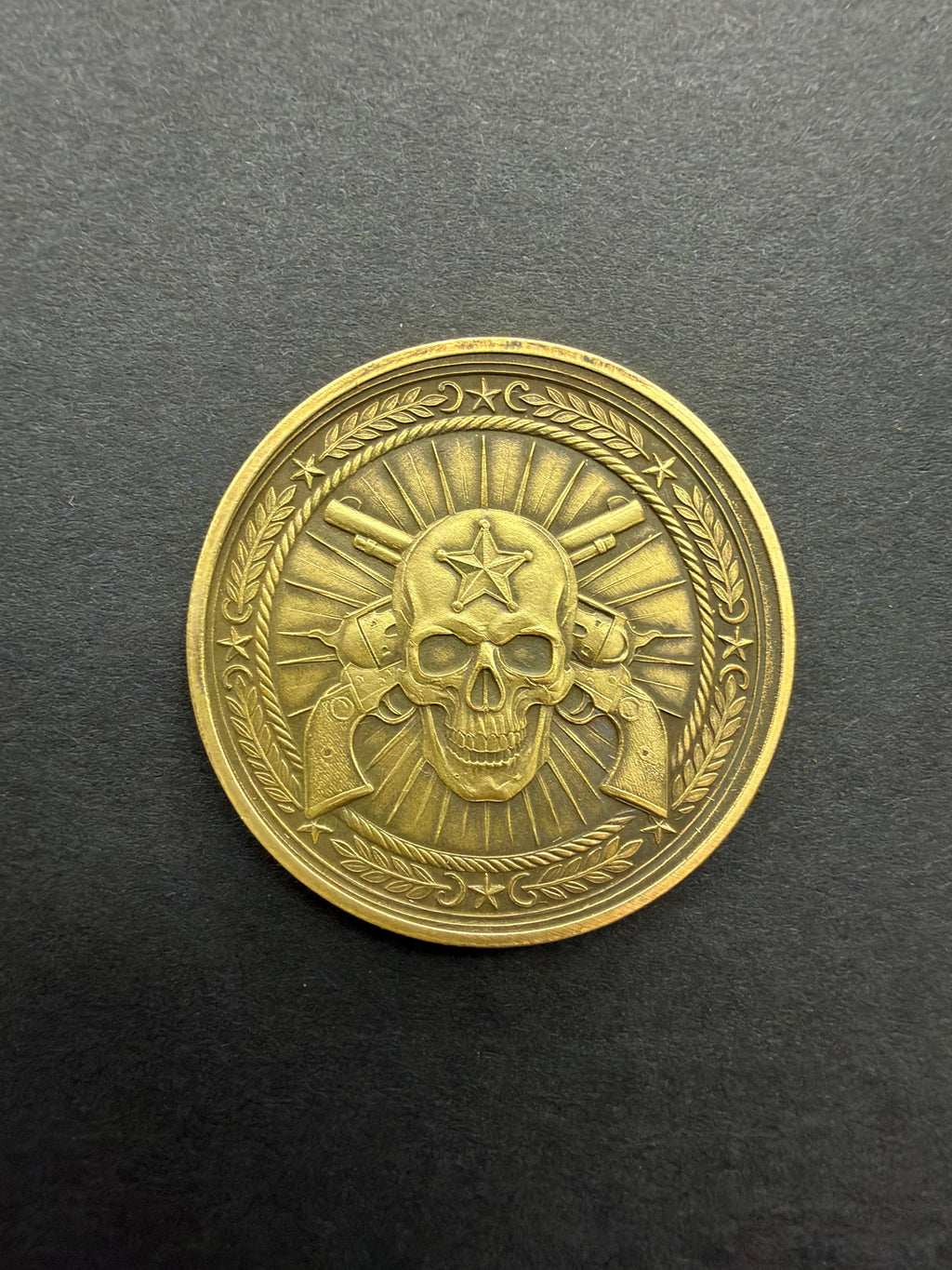 Twin Revolver skull coin